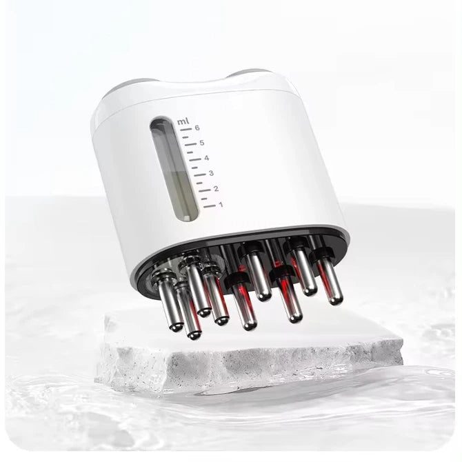 Applicateur-masseur blanc avec neuf embouts métalliques arrondis